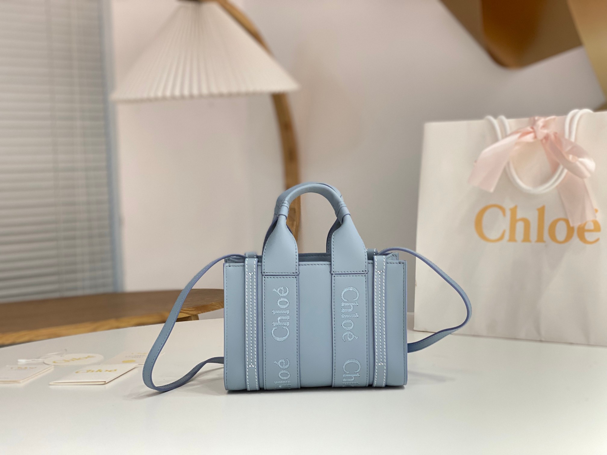 Chloe Mini Woody Tote Bag In Light Blue Soft Smooth Calfskin Leather